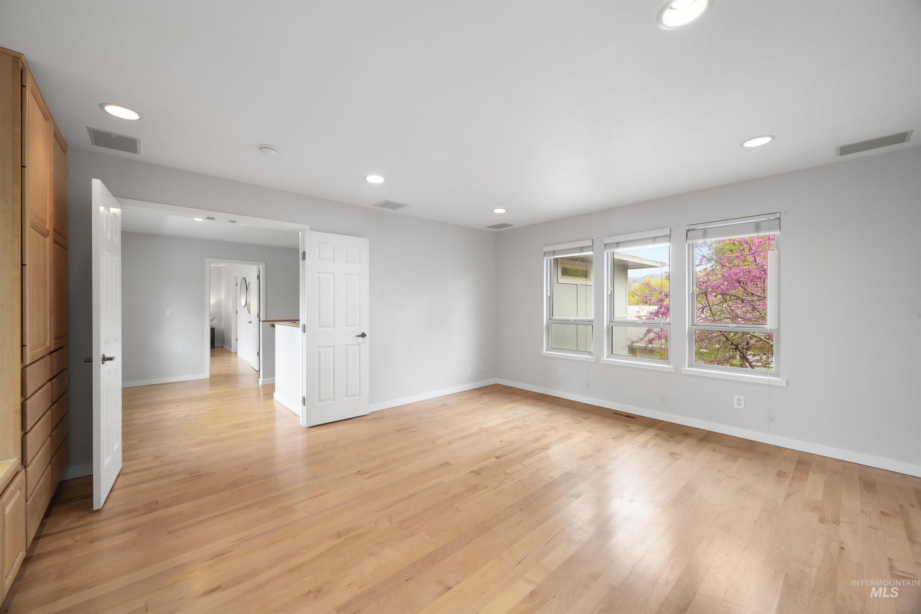 1313 Martin Street Boise, ID 83706 - Photo 33 of 46 Spare room featuring light wood-style floors and recessed lighting