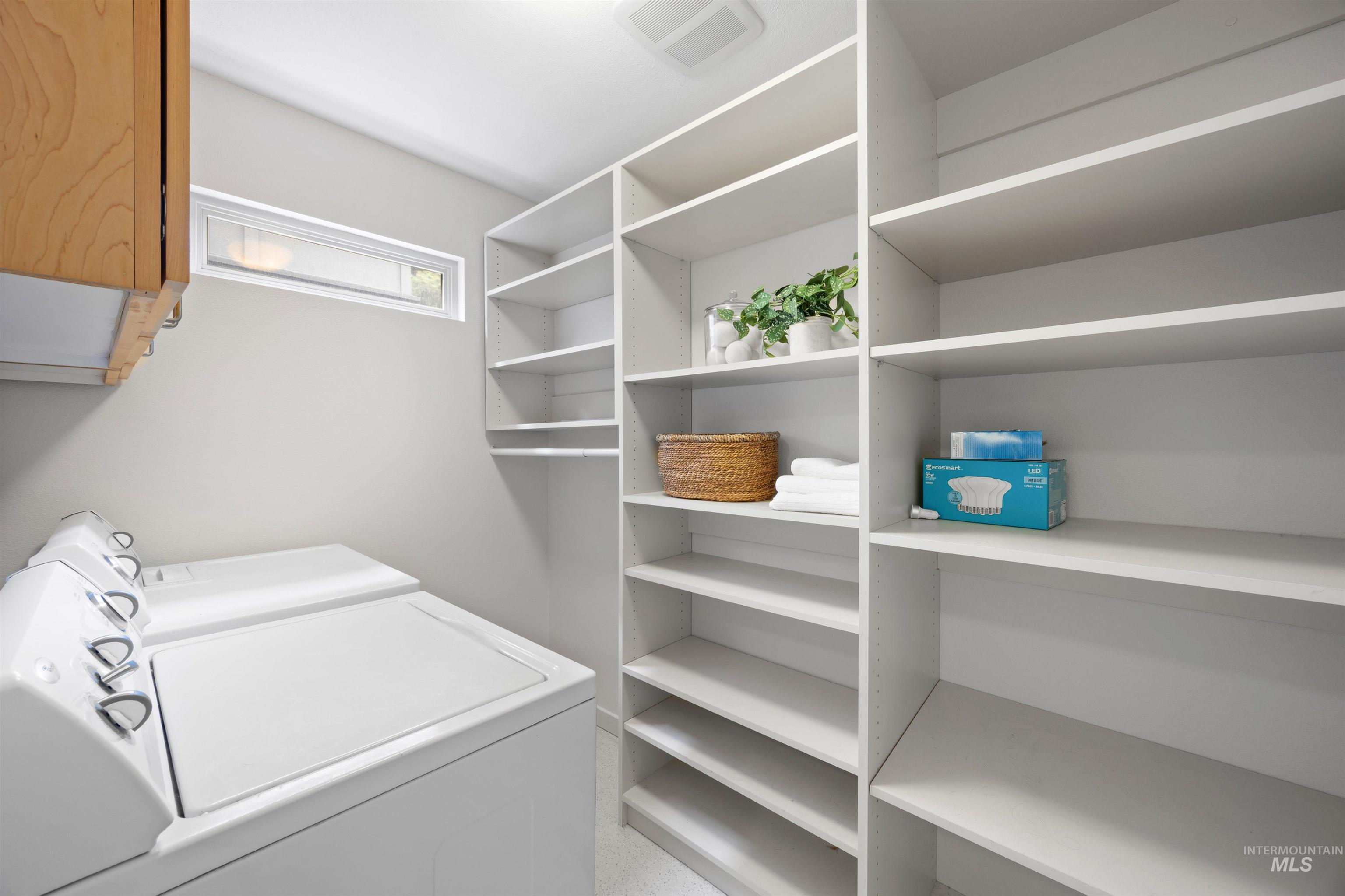1313 Martin Street Boise, ID 83706 - Photo 42 of 46 Laundry room featuring independent washer and dryer and cabinet space