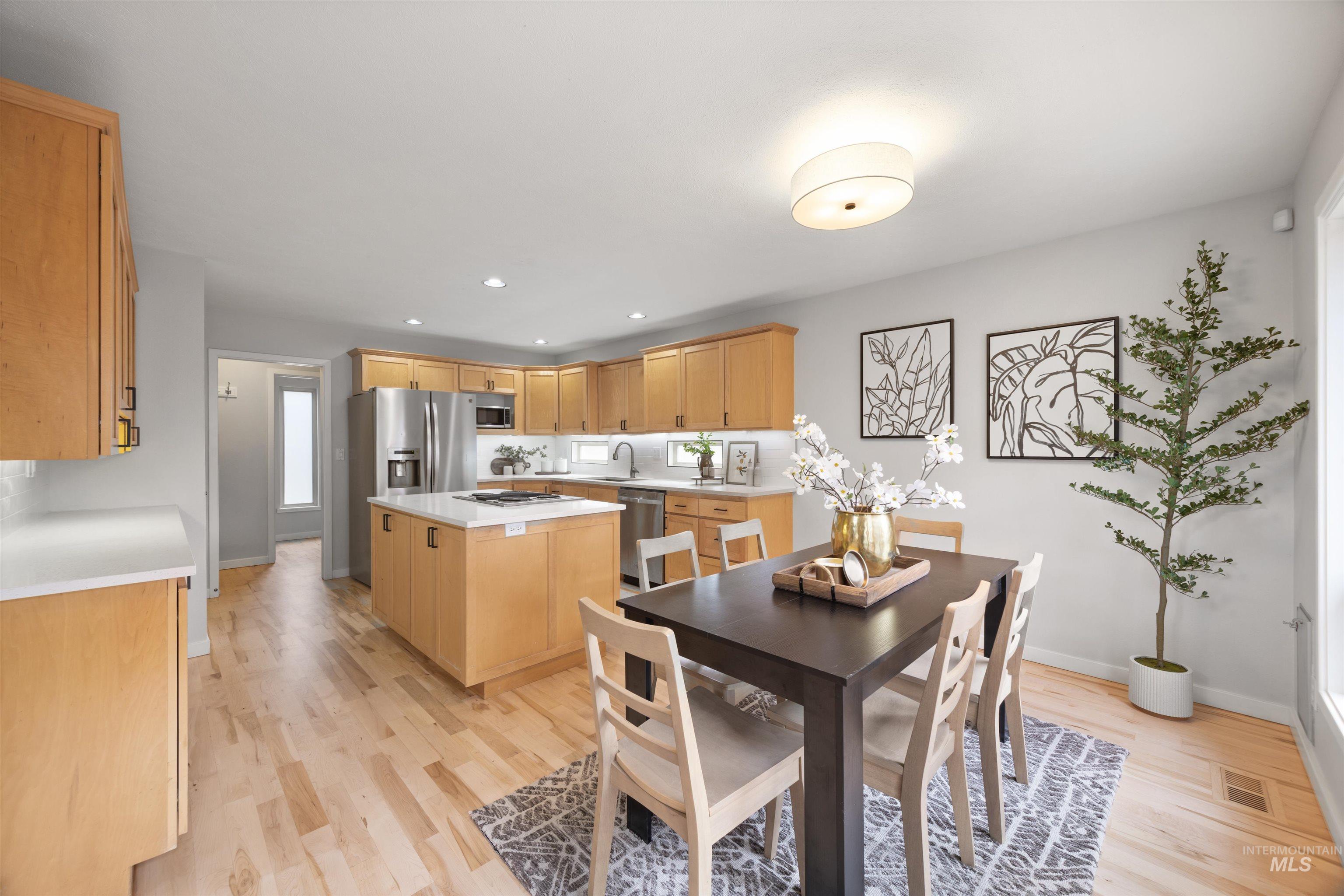 1313 Martin Street Boise, ID 83706 - Photo 5 of 46 Dining area with recessed lighting and light wood-style floors