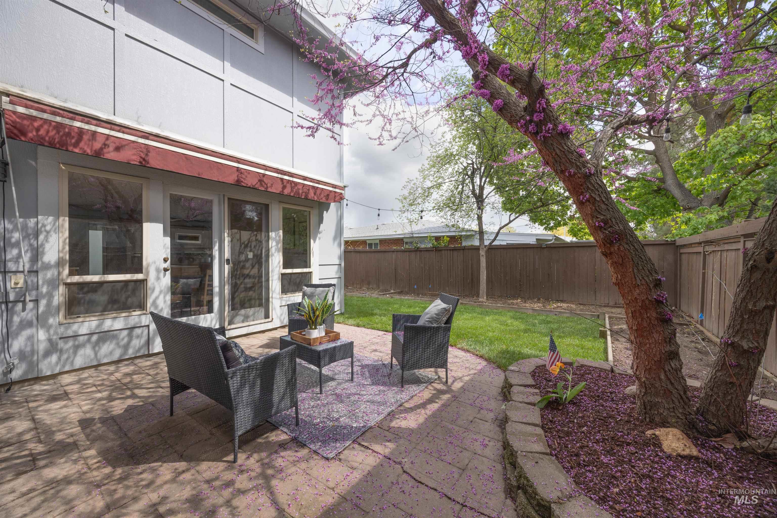 1313 Martin Street Boise, ID 83706 - Photo 8 of 46 Fenced backyard featuring a patio