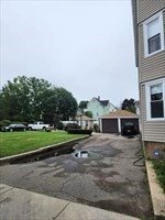 34 Averton Street, Unit 1 Boston, MA 02131 - Photo 13 of 16 a view of house with outdoor space and parking