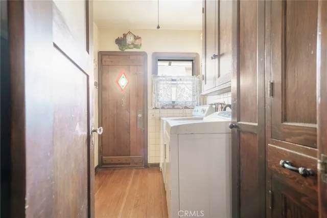 a bathroom with a sink a mirror and a shower
