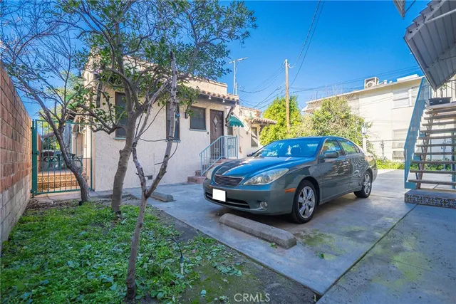 a car parked in front of a house