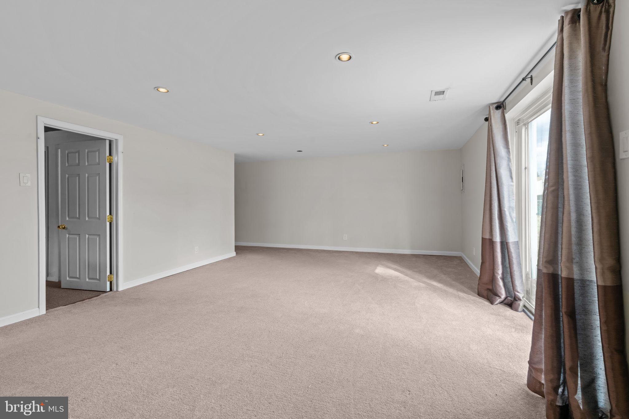 13039 Stevens Road Philadelphia, PA 19116 - Photo 19 of 32 an empty room with windows