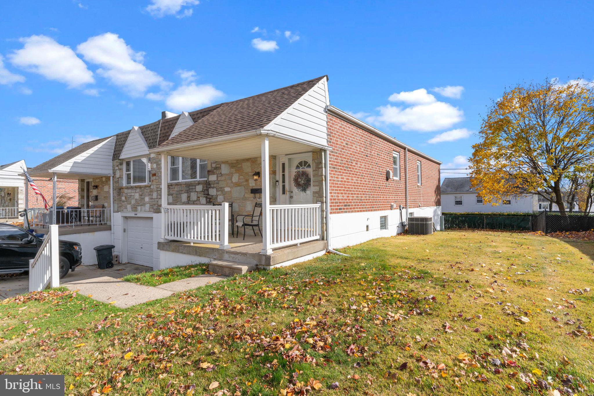 13039 Stevens Road Philadelphia, PA 19116 - Photo 2 of 32 a bathroom with a sink and a large mirror