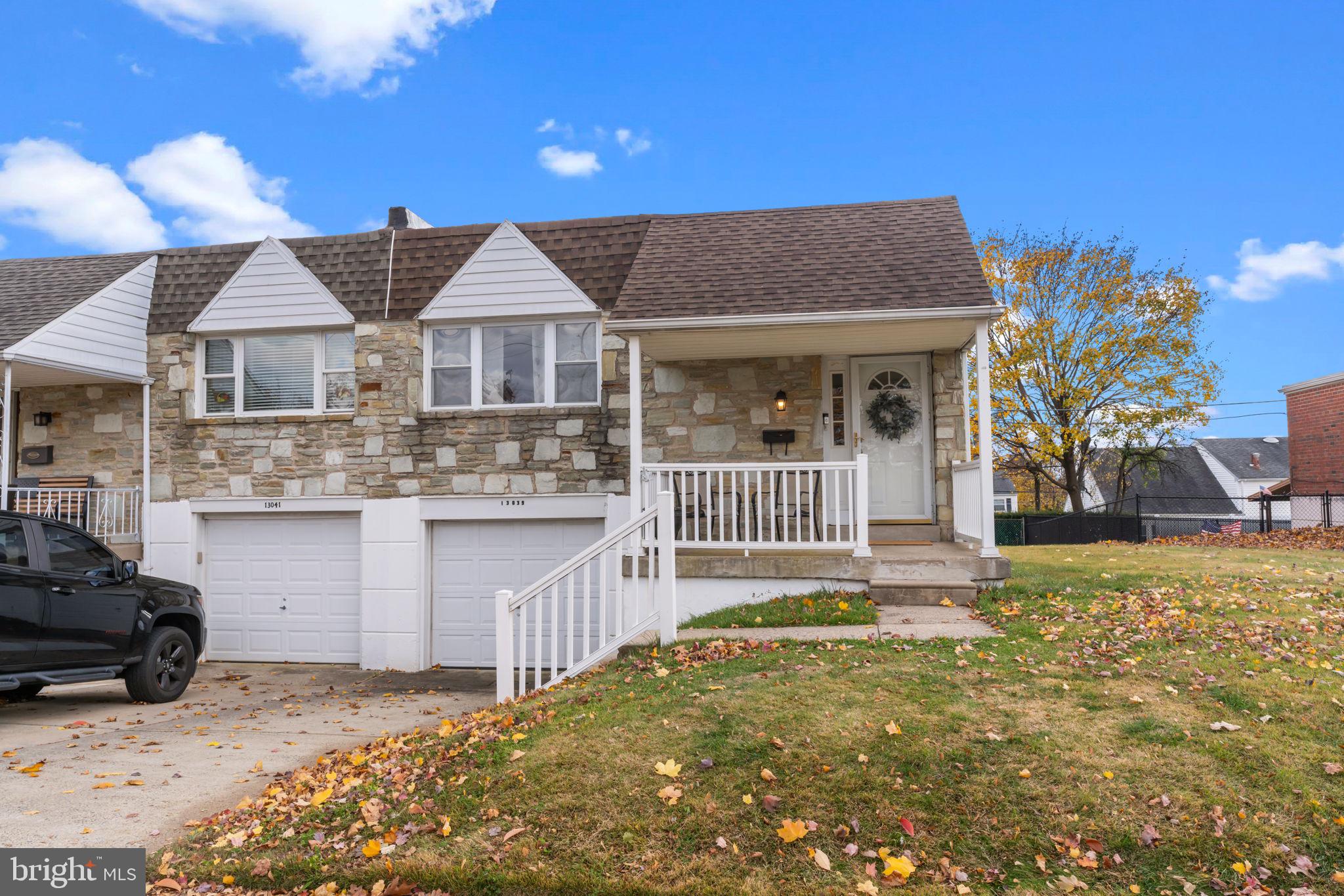 13039 Stevens Road Philadelphia, PA 19116 - Photo 24 of 32 a view of a house with wooden floor and a yard