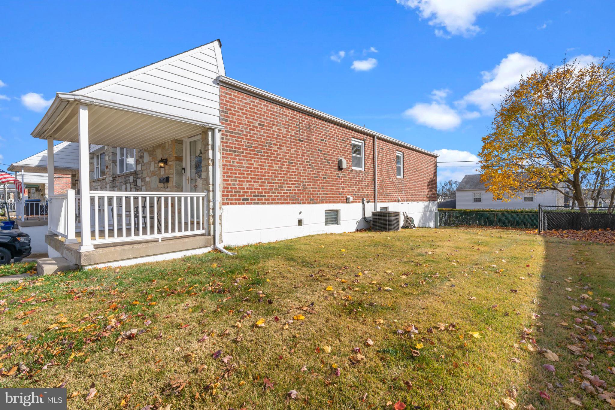 13039 Stevens Road Philadelphia, PA 19116 - Photo 29 of 32 a view of an house with backyard and tree