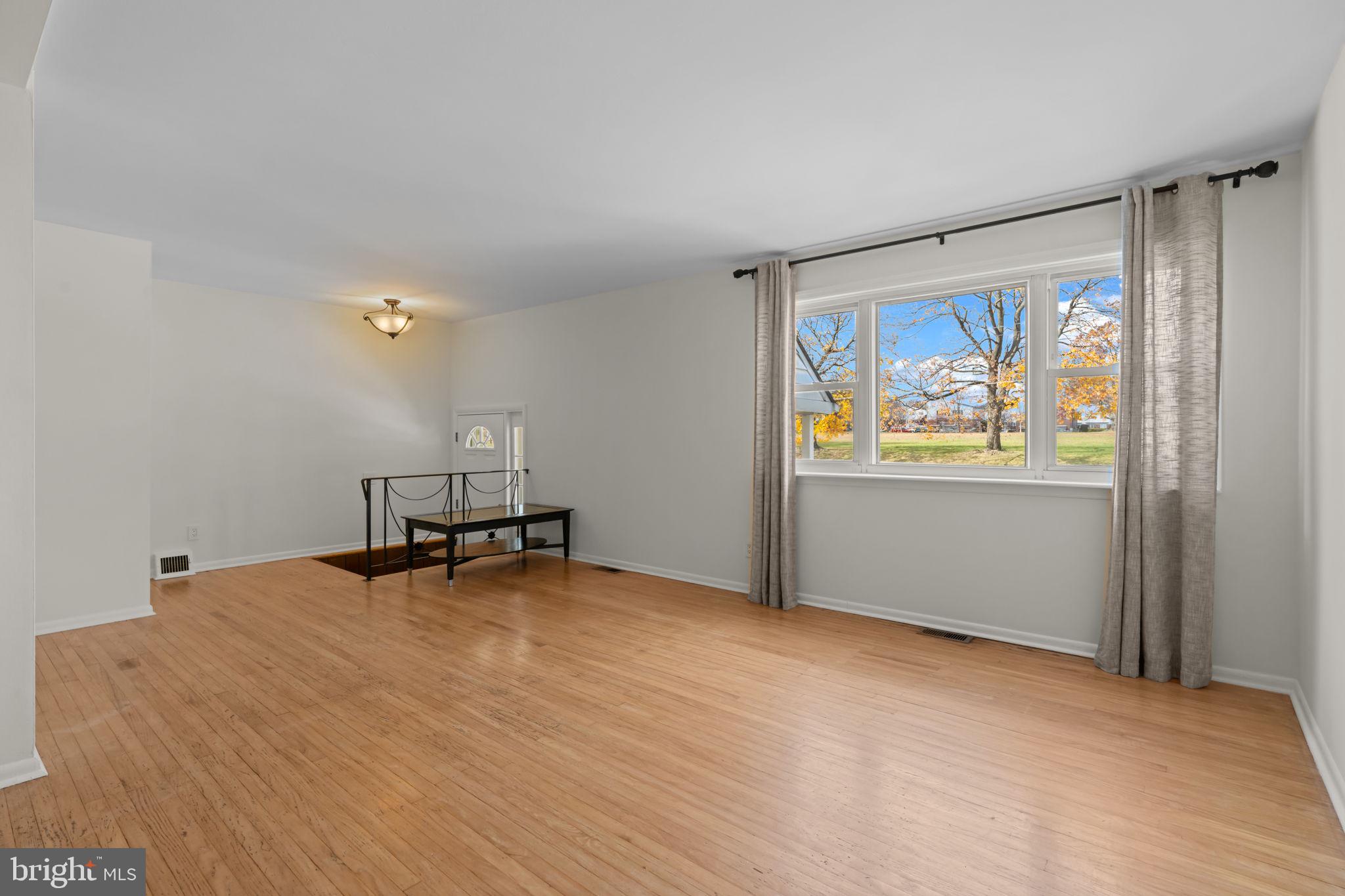 13039 Stevens Road Philadelphia, PA 19116 - Photo 4 of 32 a view of an empty room with a window
