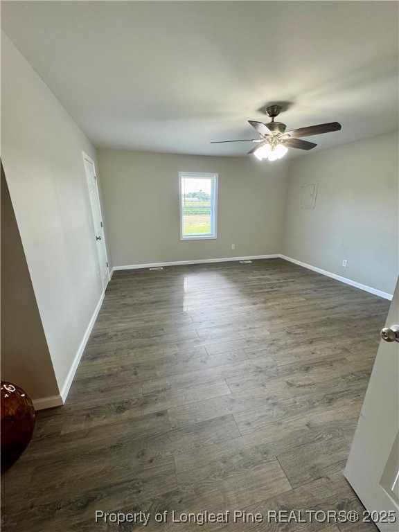 1283 Bethel Baptist Road Spring Lake, NC 28390 - Photo 20 of 44 wooden floor in an empty room with a window