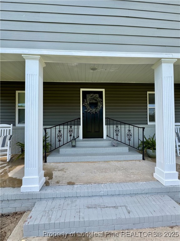 1283 Bethel Baptist Road Spring Lake, NC 28390 - Photo 2 of 44 a front view of a house with a garage