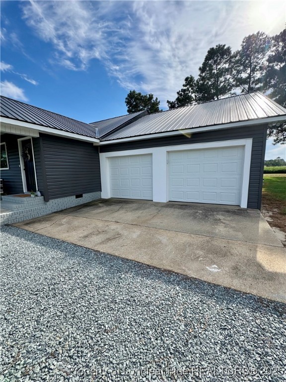 1283 Bethel Baptist Road Spring Lake, NC 28390 - Photo 29 of 44 a view of a car garage