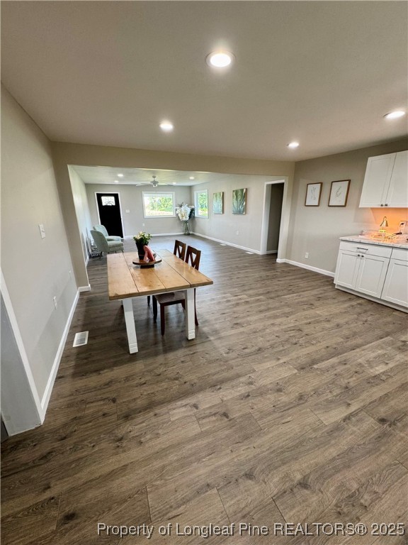 1283 Bethel Baptist Road Spring Lake, NC 28390 - Photo 7 of 44 a living room with furniture and a wooden floor