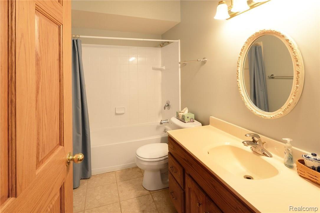 4355 North Eager Road Howell, MI 48855 - Photo 13 of 32 2nd full bathroom on main floor