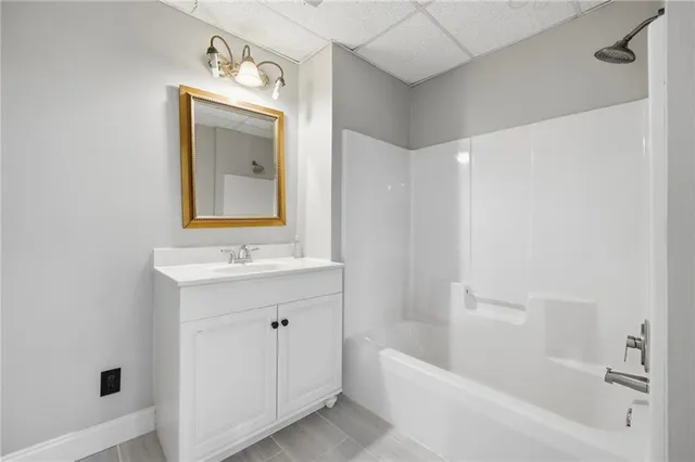 a view of room with air conditioner and wooden floor