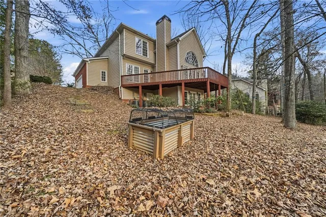 a front view of a house with parking space