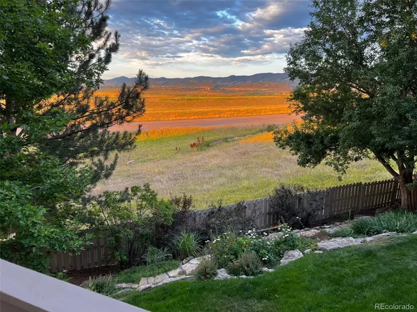 a view of a yard with an ocean view