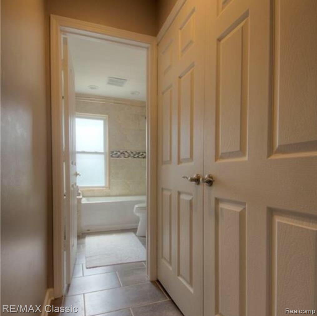 45717 Radnor Road Canton, MI 48187 - Photo 32 of 52 P1 Upper laundry Room.jpg