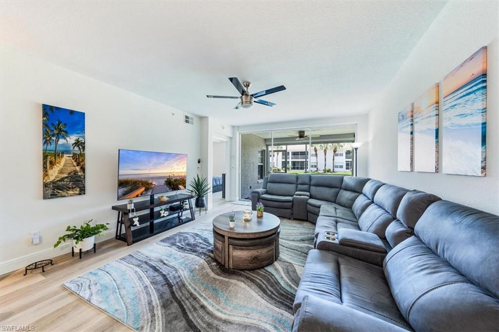 6914 Satinleaf Road North, Unit 103 Naples, FL 34109 - Photo 1 of 34