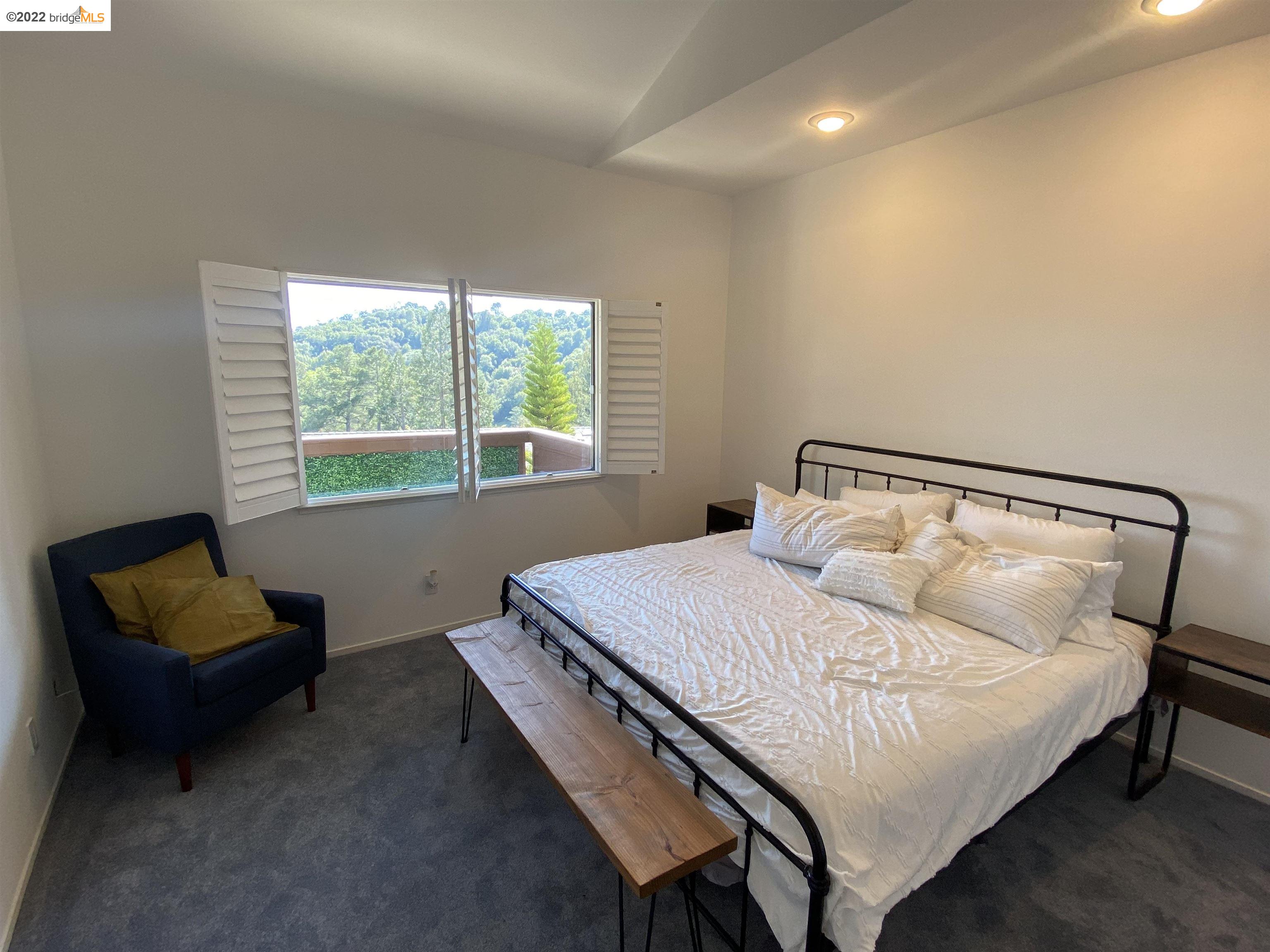1996 Ascot Drive, Unit C Moraga, CA 94556 - Photo 4 of 6 a bedroom with a bed and window