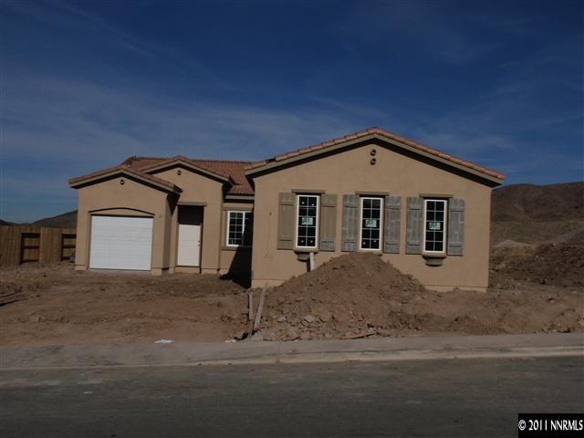 10240 Cavalry Circle Reno, NV 89521 - Photo 5 of 5 a front view of a house with a yard