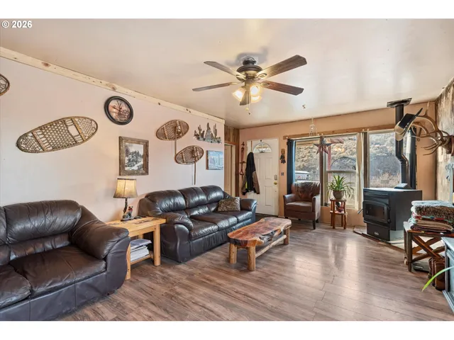 a black and white photo of a living room