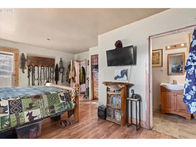 a picture of a bathroom with a shower curtain and a curtain