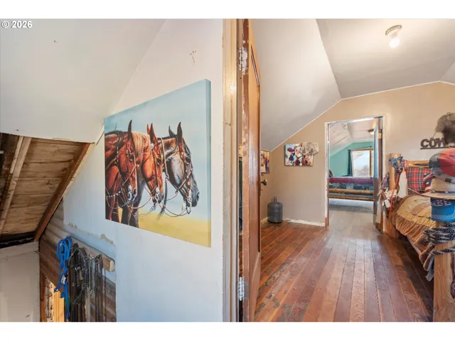 a view of a livingroom with wooden floor