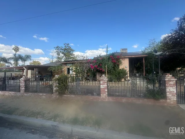 a view of a building with a tree