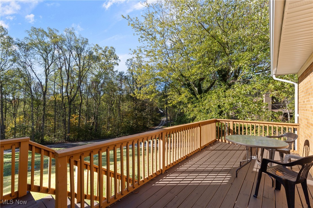 59638 Broadview Road Shadyside, OH 43947 - Photo 4 of 43 Wooden terrace featuring view of wooded area