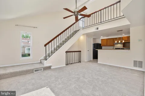 a view of an entryway with front door