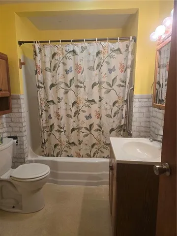 a bathroom with a sink and a toilet