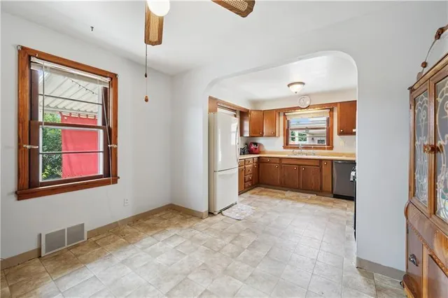 a view of a kitchen with a stove cabinets and a kitchen