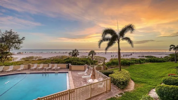 a view of a lake with a garden