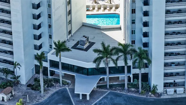 a view of a swimming pool with a lounge chairs