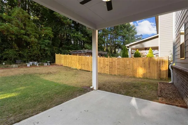 a view of backyard with tree
