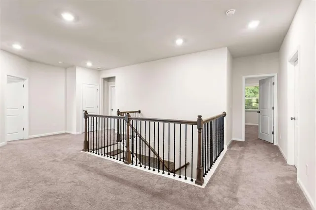 a view of a hallway with closet area