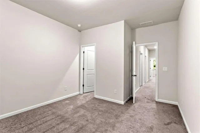 an empty room with a bathroom