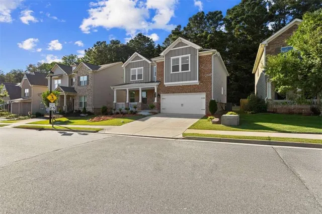 a view of swimming pool in front of residential houses