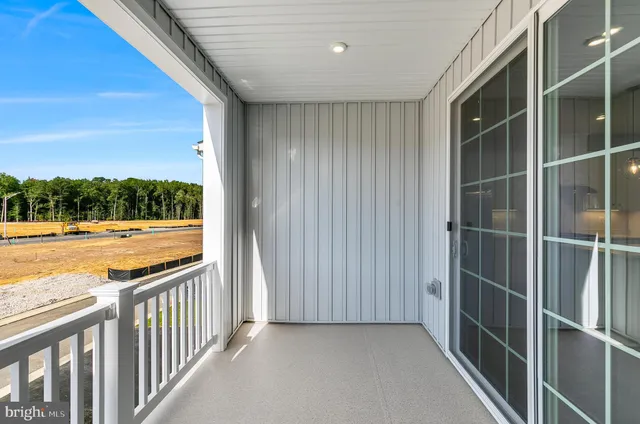 a kitchen with stainless steel appliances granite countertop a stove microwave and sink