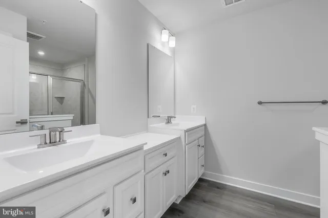 a bathroom with a shower and toilet