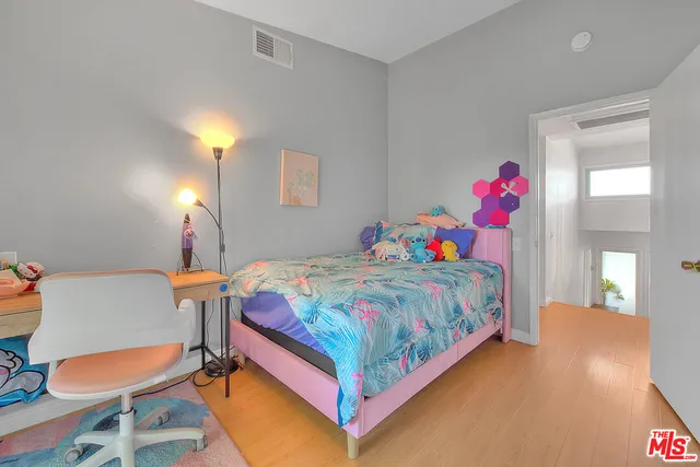 a view of a bike storage and utility room