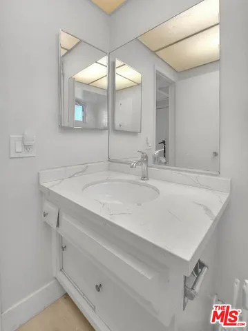 a view of a house with backyard and a patio