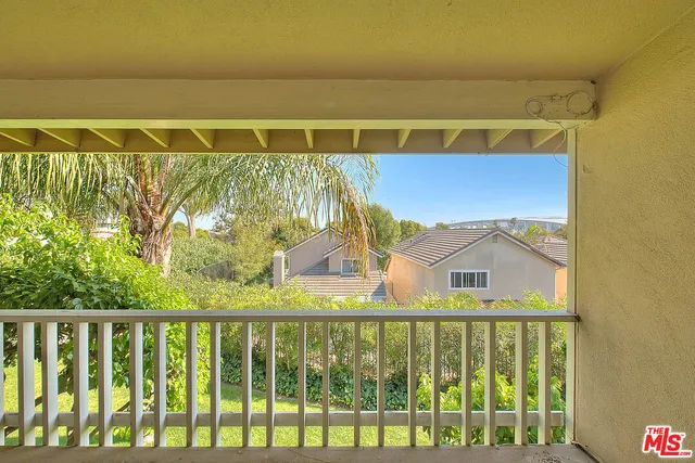 a view of a back yard of the house