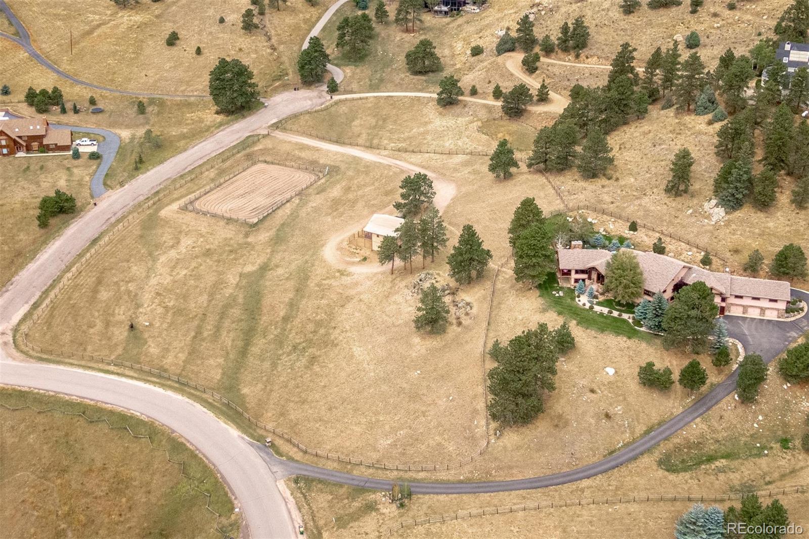 497 Meadow Vista Drive Evergreen, CO 80439 - Photo 2 of 40 a view of a swimming pool