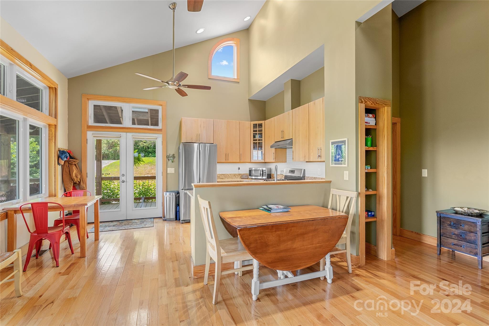 329 Cabin Hollow Drive Marshall, NC 28753 - Photo 15 of 40 a room with dining table and chairs