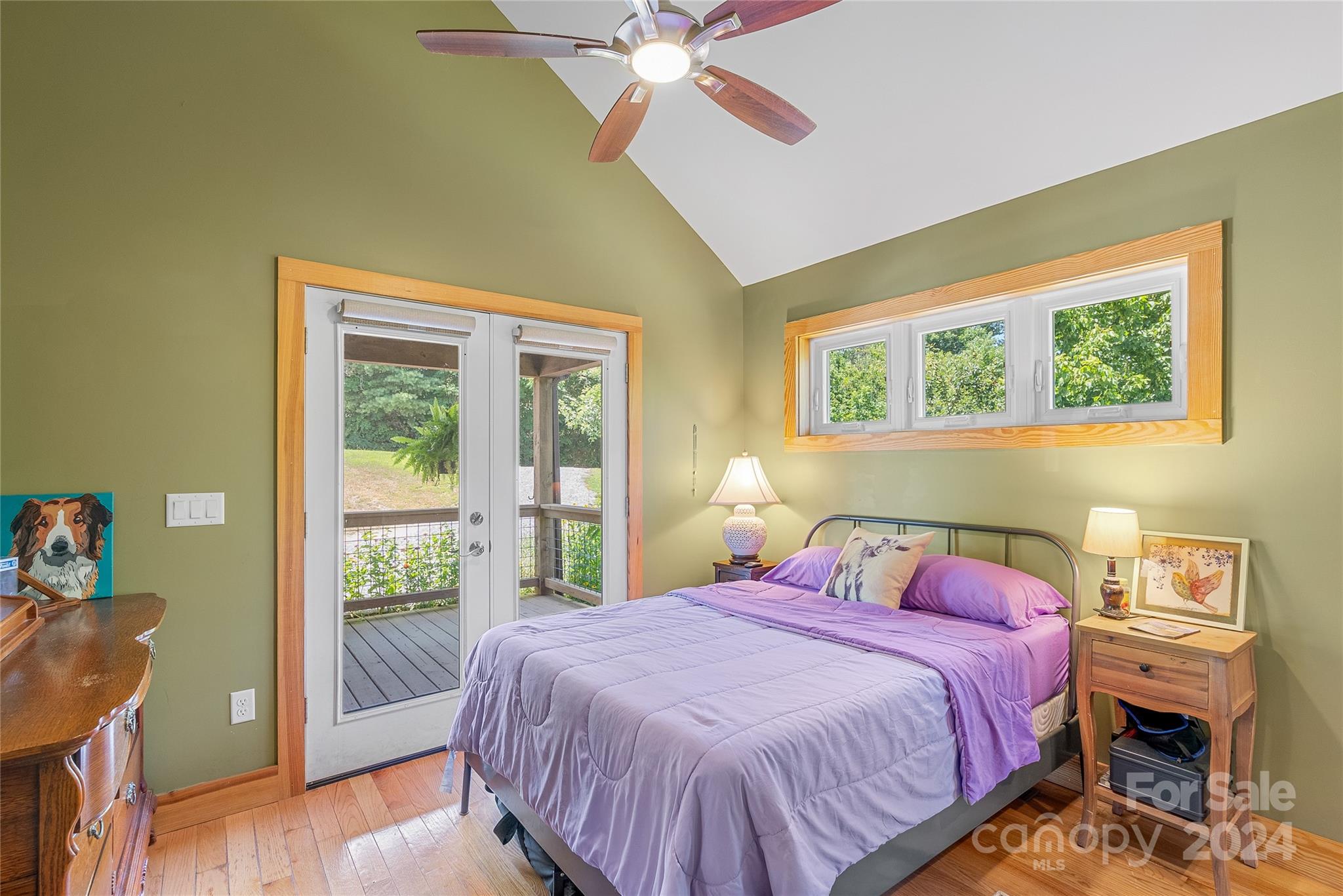 329 Cabin Hollow Drive Marshall, NC 28753 - Photo 18 of 40 a bedroom with a bed and a window