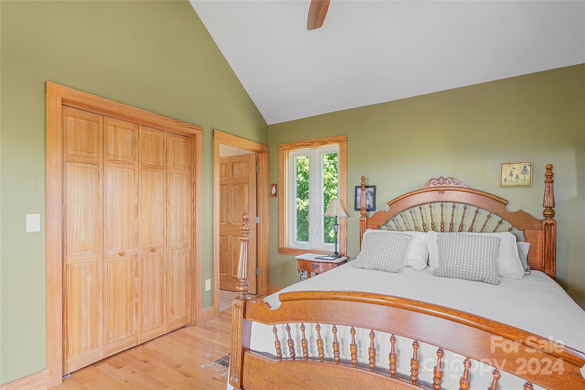 329 Cabin Hollow Drive Marshall, NC 28753 - Photo 22 of 40 a bedroom with a bed and a window