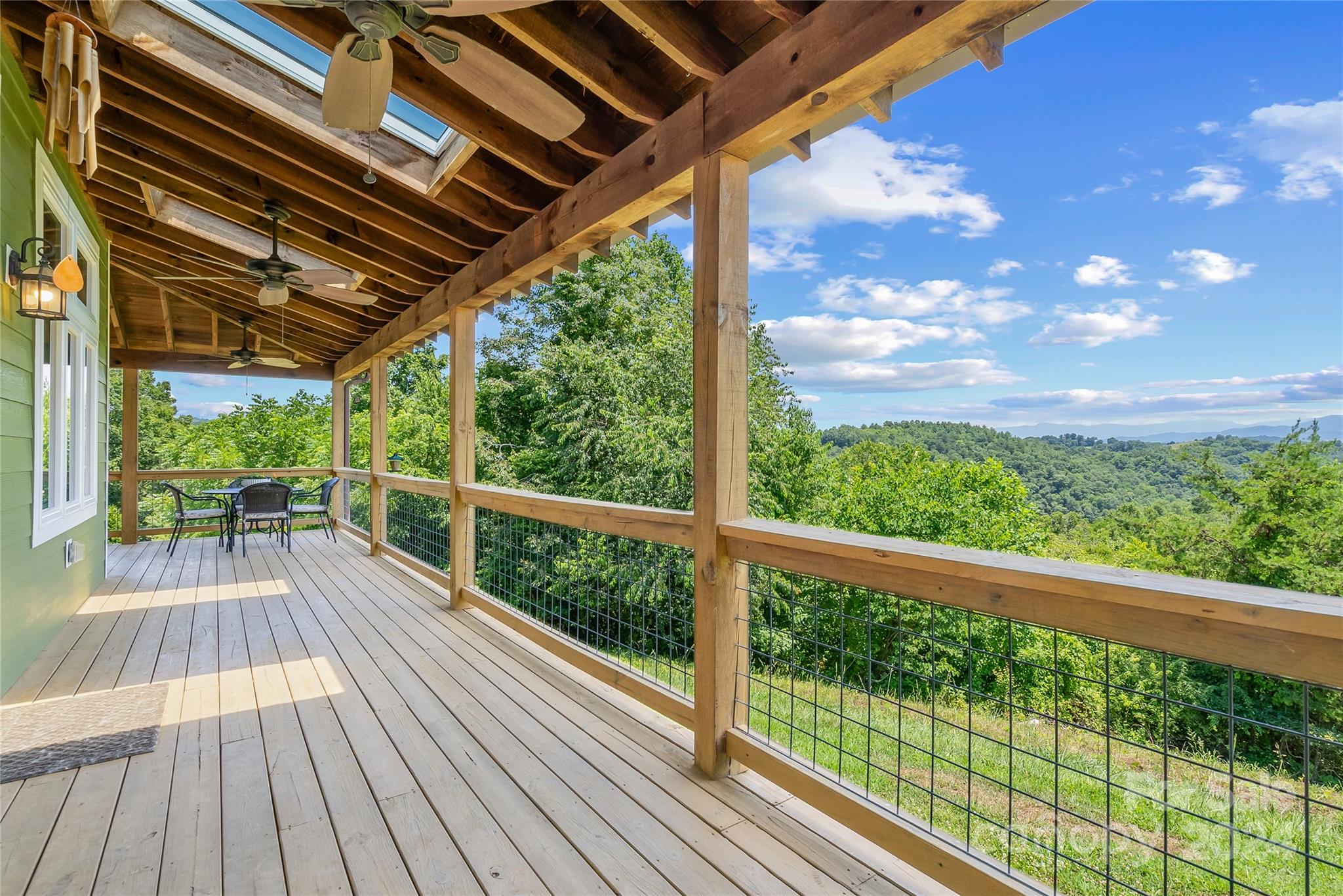 329 Cabin Hollow Drive Marshall, NC 28753 - Photo 28 of 40 a view of porch with wooden floor