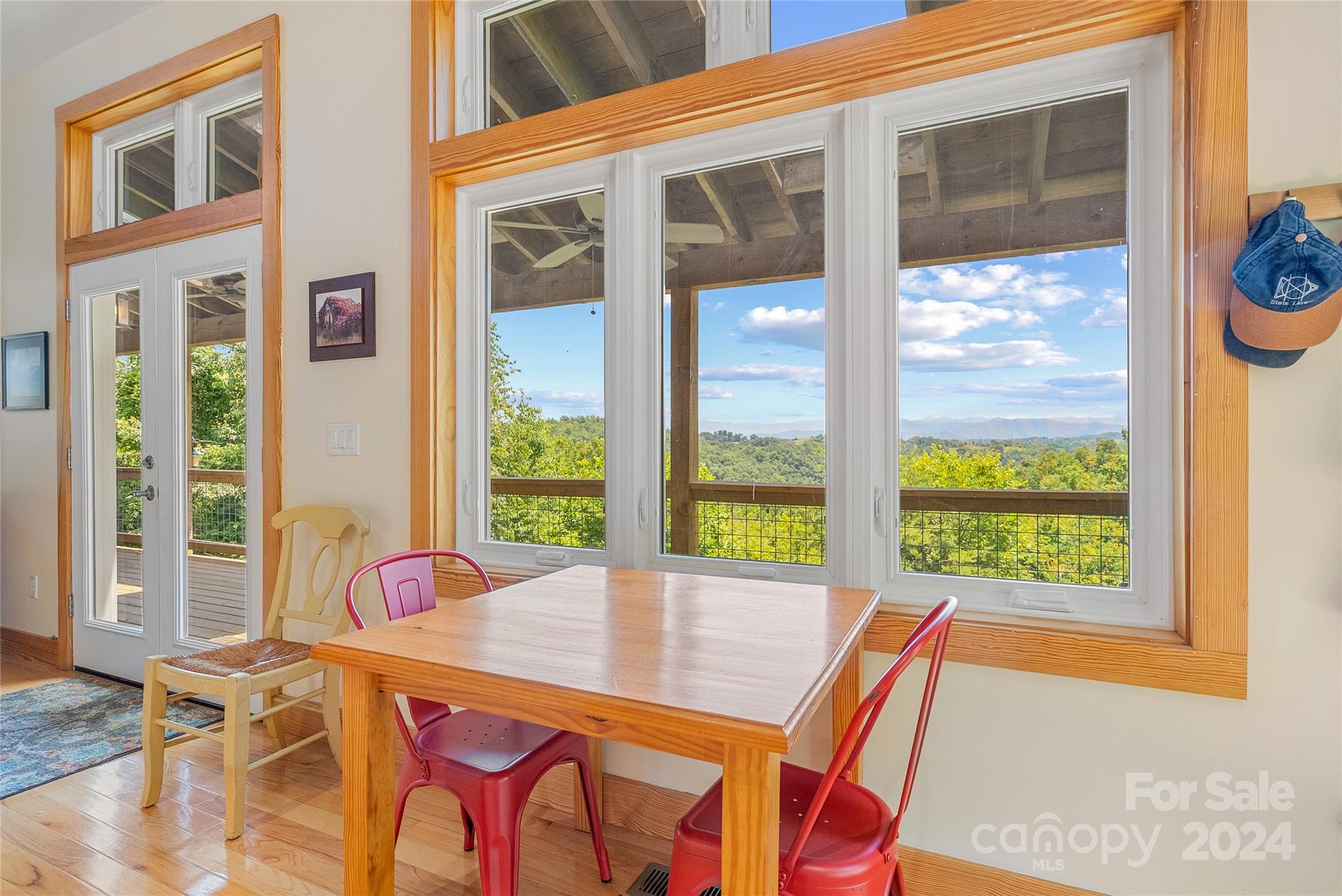 329 Cabin Hollow Drive Marshall, NC 28753 - Photo 9 of 40 a view of a dining room with a table and chairs