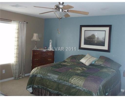 7257 Larix Road Las Vegas, NV 89113 - Photo 11 of 19 Master Bedroom.